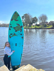 10.6 elite green turtle pattern isup paddleboard  by the river in beaulieu