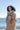 Lady Wearing Sand Colour Dry Robe Style Changing Robe By The Sea