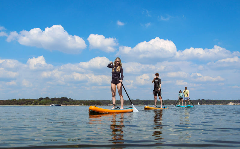 FOUR PEOPLE PADDLING WELDED RAIL PADDLE BOARDS
